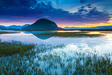 Salt marshes at dusk. Cerroja water mill. Santoￃﾱa, Victoria and Joyel Marshes Natural Park. Cantabria, Spain, Europe.