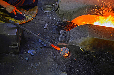 Japanese Swordsmith, Muneyasu, working at his studio in Saitama, Japan. He is part of the new generation of talented katana makers.