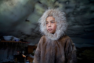 Portrait of young boy in Gojahaven, an Inuit settlement in the far north of Canada.