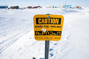 Caution sign in Gojahaven, an Inuit settlement in the far north of Canada