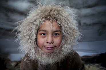 Portrait of young boy in Gojahaven, an Inuit settlement in the far north of Canada.