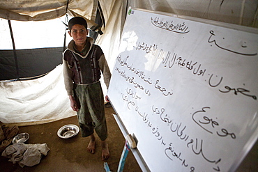 tented school in a slum in Kabul