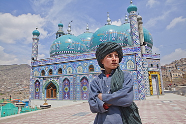 Afghan boy in front of a shia mosque in kabul