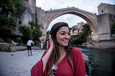 Attractive woman in Mostar's historic bridge, Mostar.