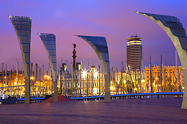 Barcelona: contemporary sculptures in Maremagnum (shopping mall). In background at left Christopher Columbus monument. harbour of barcelona