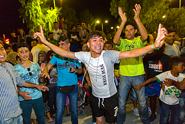 Syrian, Iraqi and Afghan refugees celebrate Eid, the end of Ramadan in Kara Tebe refugee camp, Greece