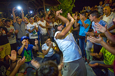 Syrian, Iraqi and Afghan refugees celebrate Eid, the end of Ramadan in Kara Tebe refugee camp, Greece