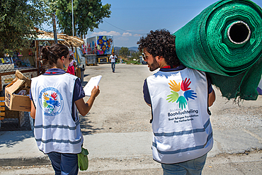 shades being distributed by Boat Refugee Foundation in Tara Tepe refugee camp in Greece