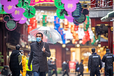 People attempt to live their daily lives in face masks amid the coronavirus outbreak, Shanghai, China.