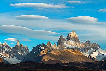 Mottled light and shadow on Mount Fitz Roy and Cerro Torre in Los Glaciares National Park near El Chalten, Argentina.  A UNESCO World Heritage Site in the Patagonia region of South America.