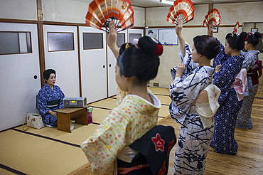 Geishas and 'maikos' (geisha apprentice) in dance class. Geisha school(Kaburenjo) of Miyagawacho.Kyoto.Kansai, Japan.