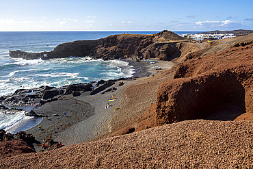 Lava beaches at the fishing village El Golfo, Lanzarote island, Canary islands, Spain,