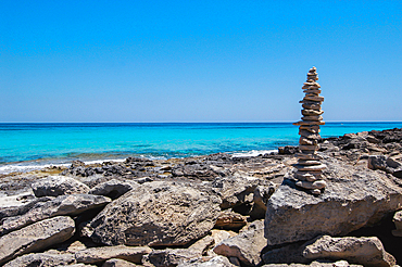 Stone sculpture on Llevant beach, Formentera, Balearic Islands, Spain