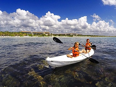 Kayakking in front of the beach of Grand Palladium White Sand Resort and Spa in Riviera Maya, Yucatan Peninsula, Quintana Roo, Caribbean Coast, Mexico