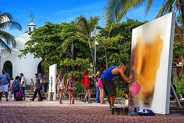 White Mexican church and street art at 5th Avenue, Playa del Carmen, Caribe, Quintana Roo state, Mayan Riviera, Yucatan Peninsula, Mexico