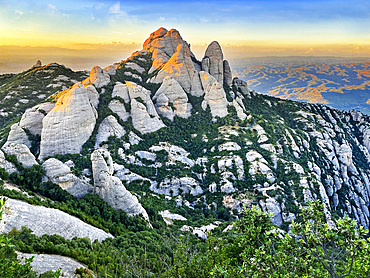 Montserrat is a mountain near Barcelona, in Catalonia. It is the site of a Benedictine abbey, Santa Maria de Montserrat, which hosts the Virgin of Montserrat sanctuary.
Montserrat is a multi-peaked mountain range near Barcelona, in Catalonia, Spain. It is part of the Catalan Pre-Coastal Range. The main peaks are Sant Jeroni (1,236 m), Montgrós (1,120 m) and Miranda de les Agulles (903 m). It is well known as the site of the Benedictine abbey, Santa Maria de Montserrat, which hosts the Virgin of Montserrat sanctuary. Montserrat literally means "saw (serrated, like the common handsaw) mountain" in Catalan. It describes its peculiar aspect with multitude of rock formations which are visible from a great distance. The mountain is composed of strikingly pink conglomerate, a form of sedimentary rock. Montserrat was designated as a National Park in 1987. On this mountain we will have access to the Monastery of Montserrat which houses the virgin that gives its name to the monastery, although it is also known as La Moreneta