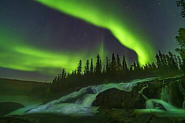 Curtains of aurora over the Ramparts falls on the Cameron River near Yellowknife, NWT, on Sept 8, 2019.