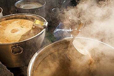 Maiking chai. Volunteer cooking for the pilgrims who visit the Golden Temple, Each day they serve free food for 60,000 - 80,000 pilgrims, Golden temple, Amritsar, Punjab, India