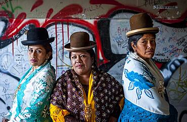 At left Benita la Intocable , in the middle Angela la Folclorista, and at right Dina, cholitas females wrestlers, El Alto, La Paz, Bolivia