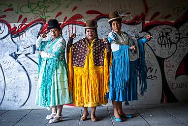 At left Benita la Intocable , in the middle Angela la Folclorista, and at right Dina, cholitas females wrestlers, El Alto, La Paz, Bolivia