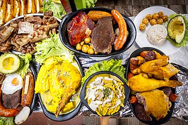 Ajiaco,chicken, sausage, black pudding, pork rinds, avocado, pollo, chorizo, morcilla, chicharron, aguacate, sancocho, soup, typical Colombian gastronomy