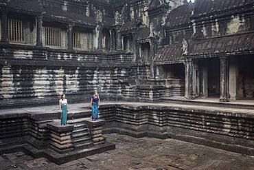 Tourists, inside Angkor Wat, Siem Reap, Cambodia