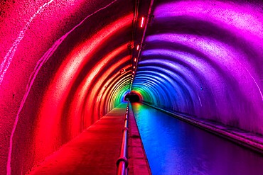 Colourful illuminated interior of the Roughcastle Tunnel at night, Edinburgh and Glasgow Union Canal, Falkirk, Scotland, United Kingdom, Europe