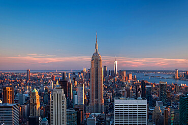 The Empire State Building and Lower Manhattan skyline at sunset, Manhattan, New York, United States of America, North America