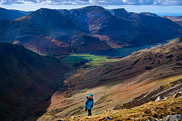 Female walker on Dale Head above Honister Pass and Buttermere Valley, Lake District National Park, UNESCO World Heritage Site, Cumbria, England, United Kingdom, Europe