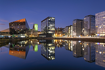 Waterfront Buildings and Modern Apartments reflected in Canning Dock at night, Liverpool Waterfront, Liverpool, Merseyside, England, United Kingdom, Europe