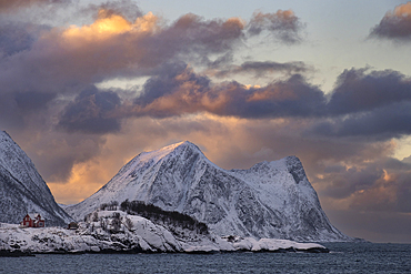 View of Hamn and Teistevika at sunset backed by Indre Teisten mountain, Hamn, Senja, Troms og Finnmark County, Norway, Scandinavia, Europe