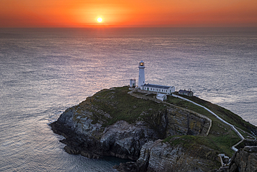 South Stack Lighthouse and the Irish Sea at sunset, Holy Island, Anglesey, North Wales, UK