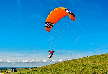 Paraglider taking off at Mount Caburn, near Lewes, East Sussex, England, United Kingdom, Europe