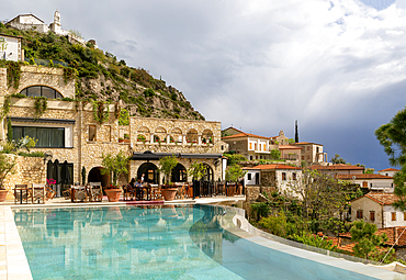 Swimming pool and converted village buildings at Zoe Hora luxury hotel, Dhermi, Albania, Europe