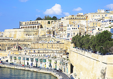 Historic waterfront buildings on Grand Harbour waterside, Valletta, Malta, Mediterranean, Europe