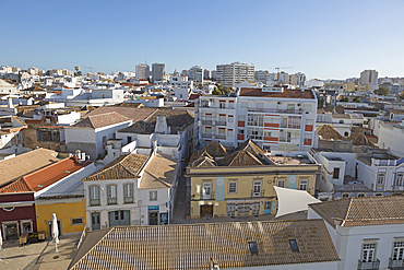 High density roof top view of buildings crowded together in the city centre of Faro, Algarve, Portugal, Europe