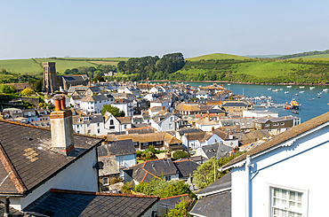 View over rooftops to boats in harbour at Salcombe, south Devon, England, United Kingdom, Europe