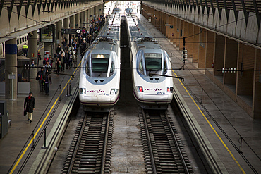 Trains at platform inside Santa Justa railway station, Seville, Spain