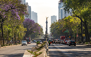 View to The Angel of Independence (El Angel de la Independencia) and traffic on Avenue Paseo de la Reforma, Mexico City, Mexico, North America