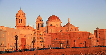 Cathedral church buildings viewed from the sea front, Cadiz, Spain