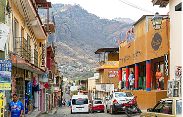 Typical town street with view to mountains, Tepoztlan, State of Morelos, Mexico, North America