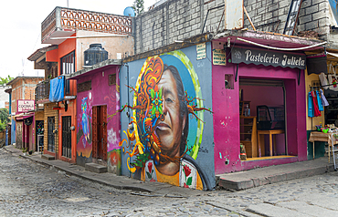 Mural painted on wall pf pasteleria shop on corner of street, Tepoztlan, State of Morelos, Mexico, North America