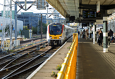 Greater Anglia class 720 Aventra train arriving at platform, Cambridge, Cambridgeshire, England, UK