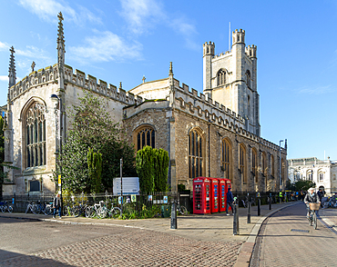 Church of Saint Mary the Great, Cambridge, Cambridgeshire, England, UK traditional red telephone boxes