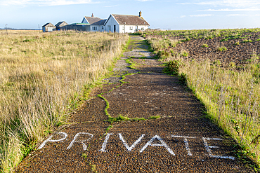 Private painted sign on driveway to restrict entry to property, The Beacons, Shingle Street, Suffolk, England, UK