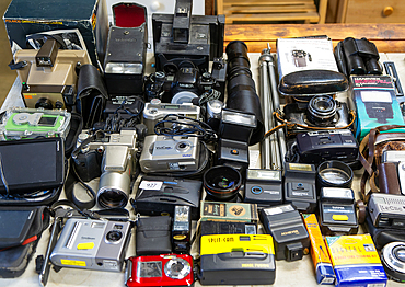 Display of old secondhand cameras and photographic equipment on display at auction, Campsea Ashe, Suffolk, England, UK
