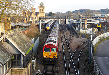 EMR British Rail Class 66 freight train and LNER Class 801 Azuma passenger train, Lincoln railway station, Lincolnshire, England, UK
