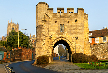 Pottergate medieval stone archway entrance to cathedral area in city of Lincoln, Lincolnshire, England, UK