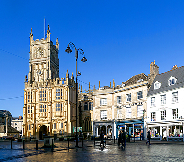 Historic buildings in market place and parish Church of St John Baptist, Cirencester, Gloucestershire, England, UK