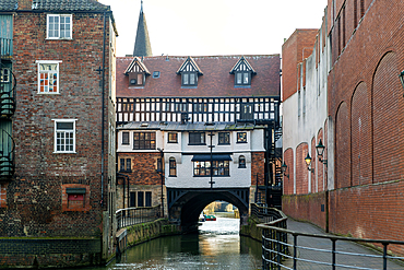 Timber framed buildings on historic High Bridge over River Witham, Lincoln, Lincolnshire, England, UK view from the west